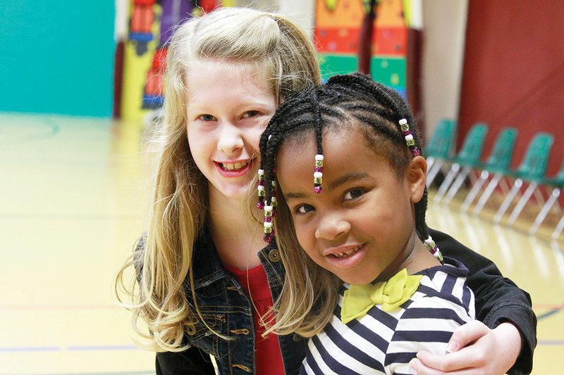 Riley Strube, 10, left, is shown with her friend Londyn Giles, 6, who is autistic. Riley received the Prudential Spirit of Community Award at Cabot Middle School South on April 16. She has logged more than 450 community service hours, including time spent with the I Can! Dance program, which works with children with special needs, where Riley met Londyn three years ago.