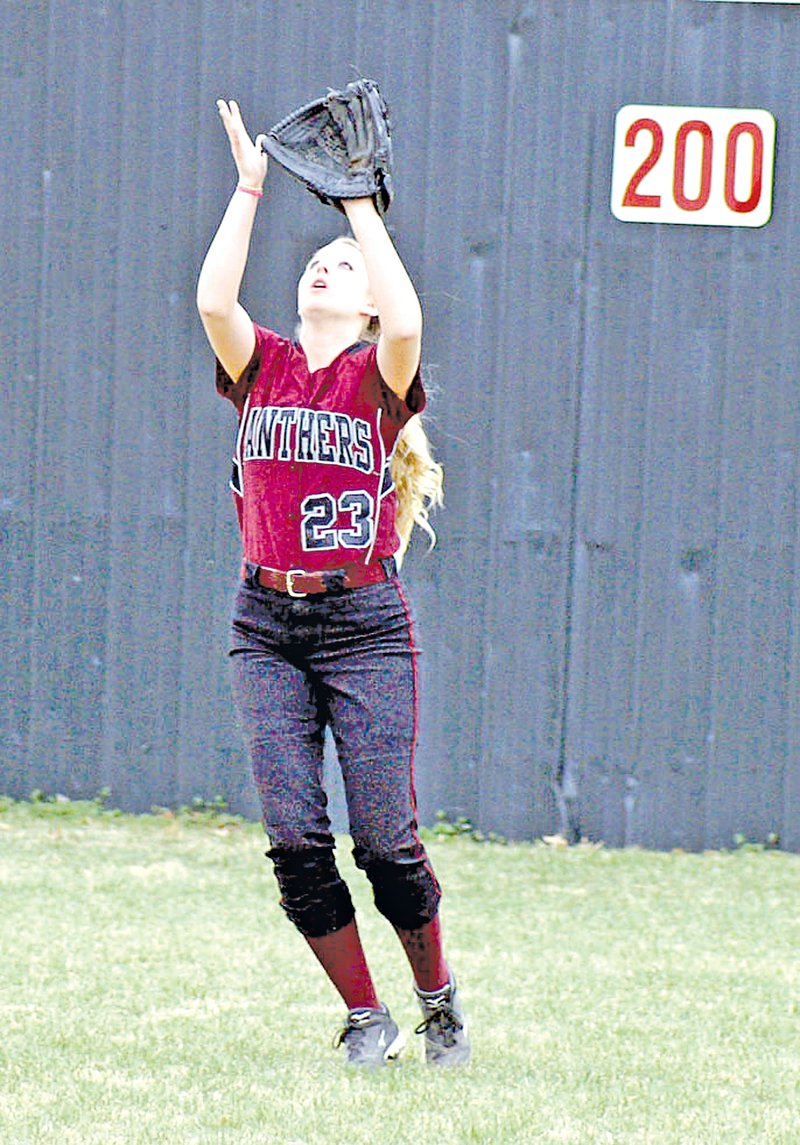 Staff Photo Randy Moll Haley Littlejohn, a Siloam Springs senior, has started in center field for the last three seasons for the Lady Panthers and is now being asked to play some infield positions.