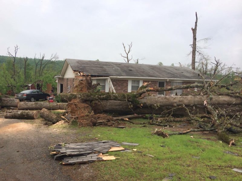 Mike Hendrixson, Paron resident and the owner of the home pictured, said Sunday night's storm damaged his home, barns and other property. He and his wife took shelter in an interior bathroom in their home during the storm. 