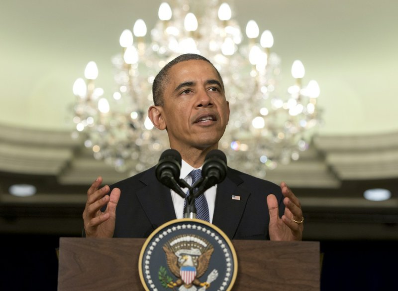 President Barack Obama speaks before participating in the signing of major commercial agreements with American businesses at the Ritz-Carlton in Kuala Lumpur, Malaysia, on Monday, April 28, 2014. 