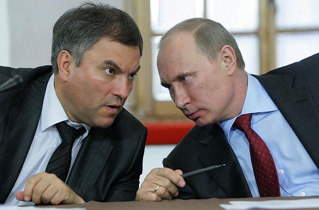 FILE - In this Monday, May 23, 2011 file photo, then, Russian Prime Minister Vladimir Putin, right, speaks with his then Chief of Staff ,Vyacheslav Volodin, during a meeting of officials in Pskov, about 600 km (375 miles) northwest of Moscow. The U.S. Department of the Treasury on Monday, April 28, 2014, designated seven Russian government officials, including two key members of the Russian leaderships inner circle, and 17 entities pursuant to Executive Order (E.O.) 13661. E.O. 13661 authorizes sanctions on, among others, officials of the Russian Government and any individual or entity that is owned or controlled by, that has acted for or on behalf of, or that has provided material or other support to, a senior Russian government official. Volodin is on the list. (AP Photo/RIA Novosti, Alexei Nikolsky, Pool, File)