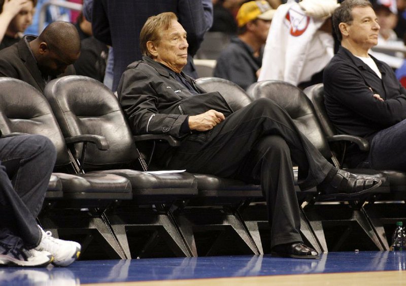 Seated courtside in the Staples Center in Los Angeles for a Clippers game against the New York Knicks on April 5, Donald Sterling (shown) remains the owner of the club for now despite receiving a lifetime ban Tuesday from NBA Commissioner Adam Silver. Sterling was also fined $2.5 million by Silver, who has called on owners to force Sterling to sell the team. 