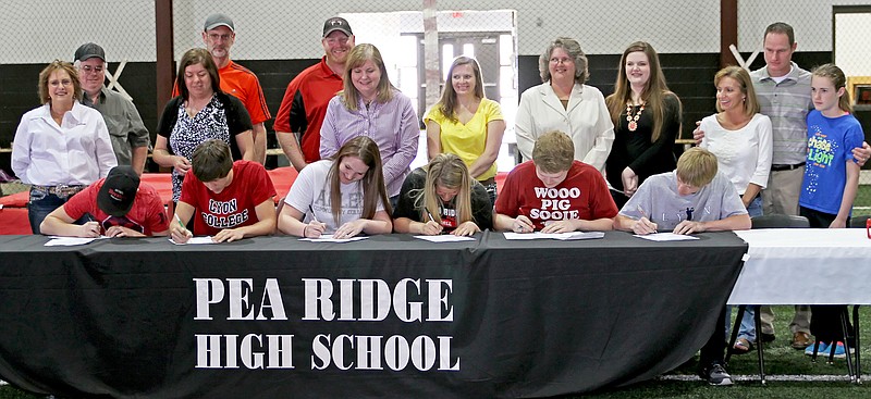 Photograph courtesy of Russ Wilson Several Blackhawk athletes received college scholarships and signed letters of intent. Athlete-students signing were, from left: Colton Watkins, Logan Rose, Sara Kahle, Jerika Schooley, Ty Conner and Nick Mooneyhan.