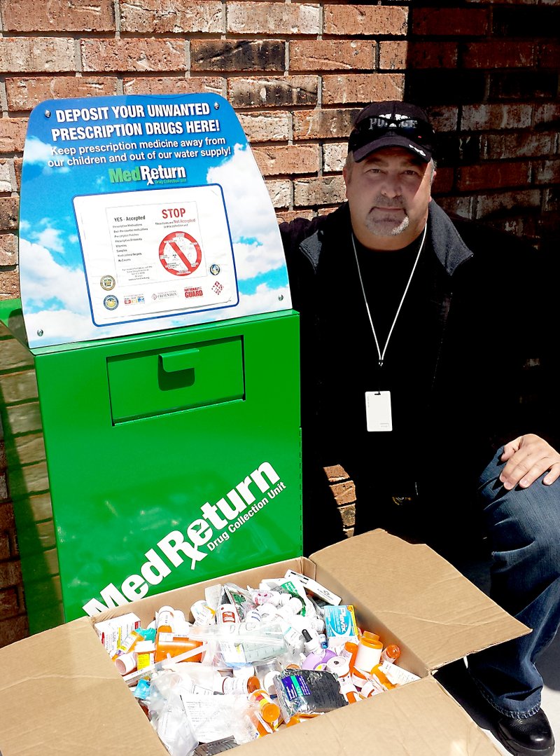 More than 34 pounds of outdated or unwanted miscellaneous and over-the-counter drugs were collected at the Gravette police station during the recent &#8220;Arkansas Take Back Drugs&#8221; day, according to Sgt. James &#8220;Rusty&#8221; Rusterholz, who was in charge of the project. The project is an effort to prevent contamination of ground water and to prevent such drugs from falling into the hands of children. Photo by Dodie Evans