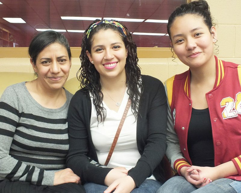 TIMES photograph by Annette Beard Reunited, Marisol Soto, flanked by her mother, Andrea Caldera Vazquez, left, and sister, Mariana, right, said she was excited to be able to come home and hug her mom, dad and sister again.