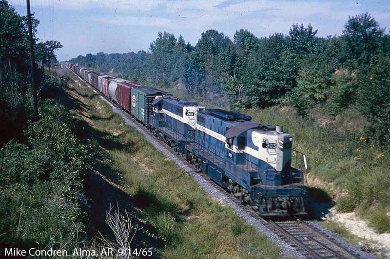 Courtesy Mike Condren Mike Condren snapped this photo in 1965 of a train passing through Alma. Condren, a railroad historian and photographer, will speak on railroads of Crawford County Sunday at the Drennen-Scott Historic Site in Van Buren. Chuck Girard, a member and former national director of the Arkanas-Boston Mountains chapter of the National Railway Historical Society, joins Condren in the presentation.