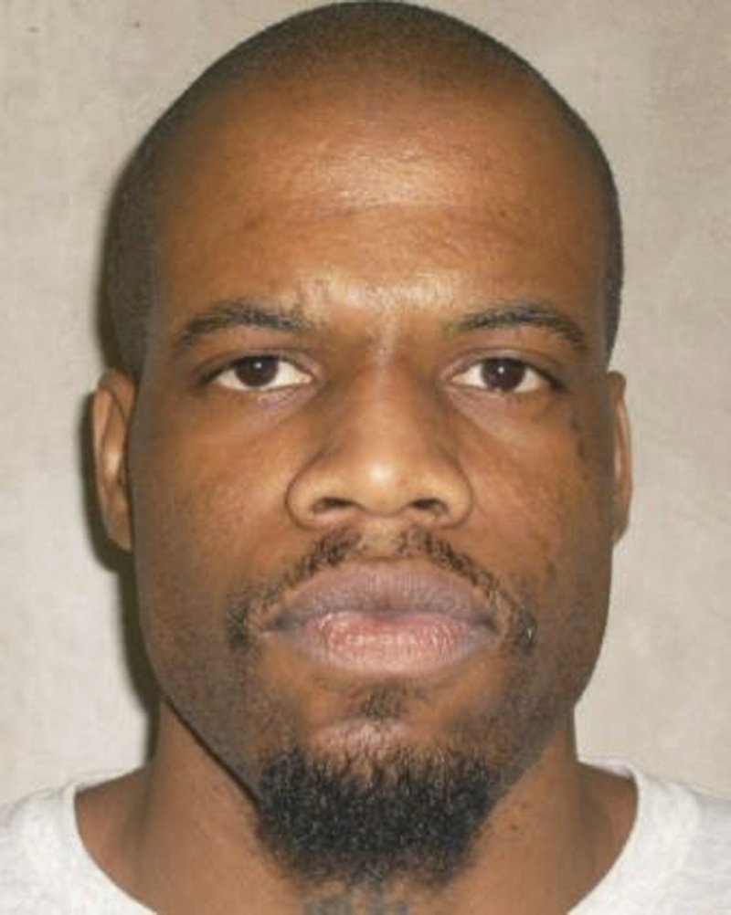 This June 29, 2011, file photo provided by the Oklahoma Department of Corrections shows Clayton Lockett. Oklahoma prison officials halted the execution of Lockett on Tuesday, April 29, 2014, after the delivery of a new three-drug combination failed to go as planned.