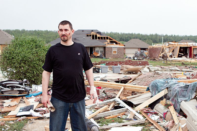 Shawn Riddle, 39, stands where his home used to be in the Parkwood Meadows subdivision, which was heavily damaged by the tornado that hit Vilonia just before 8 p.m. Sunday. Riddle’s wife, Melissa, and their three children were injured. Shawn said Tuesday that Melissa remained hospitalized with a broken pelvis and other injuries. He suffered a broken finger, cuts and bruises in the storm, which had winds of at least 135 mph, according to the National Weather Service.