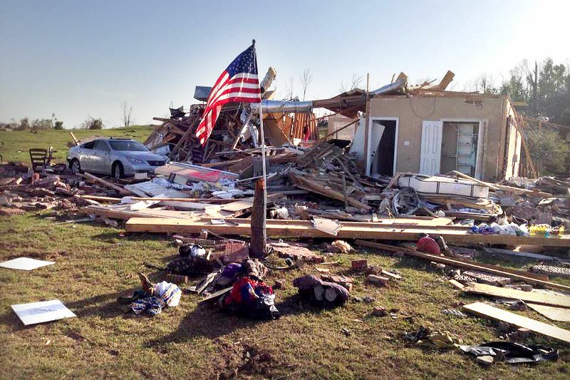 The tornado Sunday through central Arkansas destroyed Mark and Liz Patterson's home outside Mayflower.