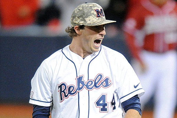 Mississippi pitcher Aaron Greenwood reacts to the final out against Arkansas at an NCAA college baseball game in Oxford, Miss., Friday, May 2, 2014.