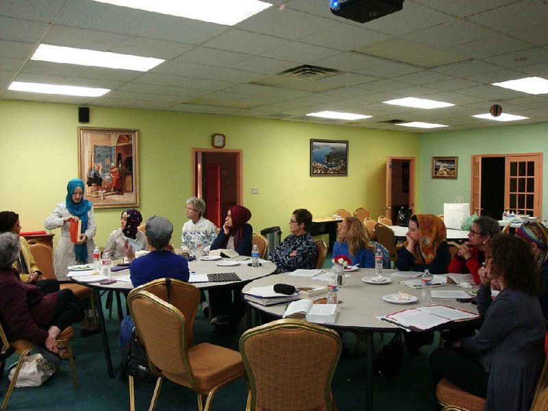 Christian, Jewish and Muslim members of the Daughters of Abraham book club gather each month to talk about faith and learn about one another’s religious traditions. 