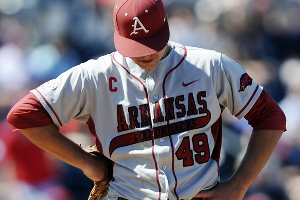 Arkansas pitcher Jalen Beeks (49) reacts to being pulled from the game afterthre and two-thirds innings with the Razorbacks trailing Mississippi 6-4 in an NCAA college baseball game at Oxford-University Stadium in Oxford, Miss., on Saturday, May 3, 2014. (AP Photo/Oxford Eagle, Bruce Newman)