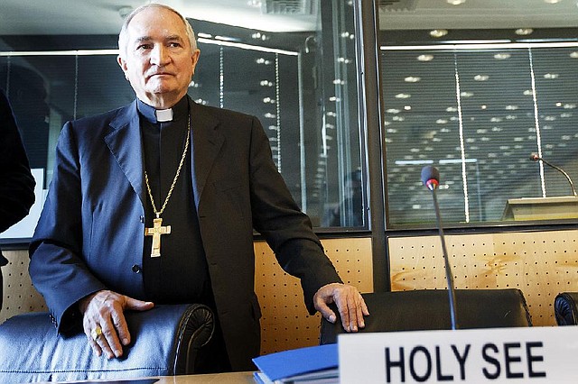 Archbishop Silvano M. Tomasi, Apostolic Nuncio, Permanent Observer of the Holy See (Vatican) to the Office of the United Nations in Geneva, arrives prior the UN torture committee hearing on the Vatican, at the headquarters of the office of the High Commissioner for Human Rights (OHCHR) in the Palais Wilson, in Geneva, Switzerland, Monday, May 5, 2014. The UN Committee Against Torture hearings the Holy See for the first time for consider whether the church's handling of child sexual abuse complaints has violated its obligations against subjecting minors to torture and on the Vatican on its efforts to stamp out child sex abuse by priests. (AP Photo/Keystone, Salvatore Di Nolfi)