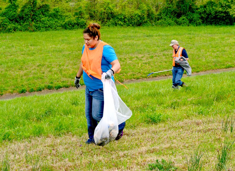 Cherokee Casino employees brave the weather, clean up trash along U.S