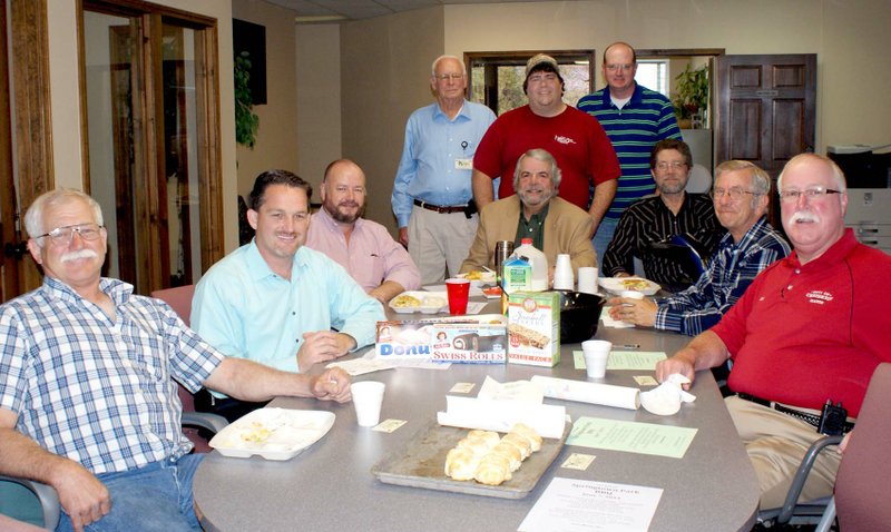 Mayors Meet in Gravette Photo by Dodie Evans Gravette Mayor Byron Warren was &#8220;chief chef&#8221; for a breakfast attended by mayors of west-side Benton County towns one morning recently. The group met at Gravette City Hall where Warren prepared omelets, biscuits, and more. Attending, seated from the left, are Springtown Mayor Paul Lemke, Gentry Mayor Kevin Johnston, Sulphur Springs Mayor Greg Barber, Siloam Springs Mayor John Turner, Gravette City Recorder/Treasurer Mike von Ree, Decatur Mayor Charles Linam, and Centerton Mayor Bill Edwards. Standing are Mayor Warren and Highfill Mayor Stacy Digby. U.S. Senator John Boozman, who was scheduled to speak to the group, was unable to attend because he was undergoing heart surgery.