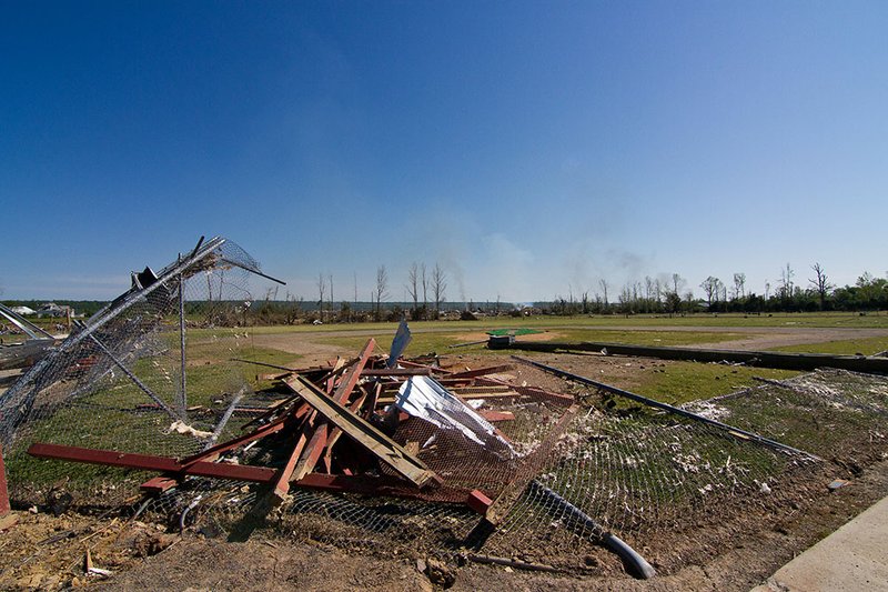 Home plate is covered with debris at a baseball field in Vilonia City Park, which was destroyed by a tornado on April 27. The park was previously damaged by a tornado in 2011.