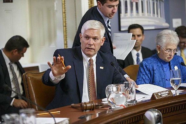 House Rules Committee Chairman Pete Sessions, R-Texas, joined by Rep. Virginia Foxx, R-N.C., (right) counters a point from Democrats on the panel as lawmakers work Wednesday at the Capitol on the creation of a special select committee to investigate the 2012 attack on the U.S. diplomatic outpost in Benghazi, Libya, that killed the ambassador and three other Americans. 