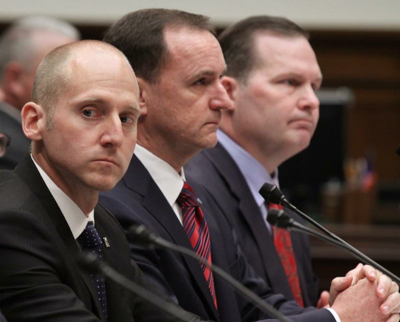 Insurance executives (from left) Brian Evanko, with Cigna; J. Darren Rodgers, with Health Care Service Corp.; and Dennis Matheis, with Wellpoint; testify Wednesday before the House Committee on Energy and Commerce’s Subcommittee on Oversight and Investigations in Washington. 