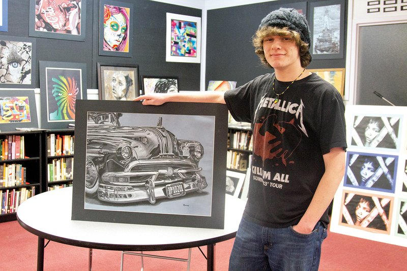 Jacksonville High School senior Joseph Gomez has won several awards for his artwork. His favorite medium is charcoal, which he often uses to draw cars.
