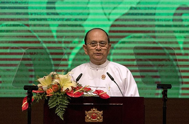 Myanmar's President Thein Sein delivers opening statement of Association of Southeast Asian Nations leaders Summit in Naypyitaw, Myanmar, Sunday, May 11 2014. Concerns over China's aggressive behavior in the South China Sea were a key topic Sunday in the first regional summit hosted by Myanmar, which is hoping to demonstrate the progress it's made since emerging from a half-century of brutal military rule.  (AP Photo/Gemunu Amarasinghe)