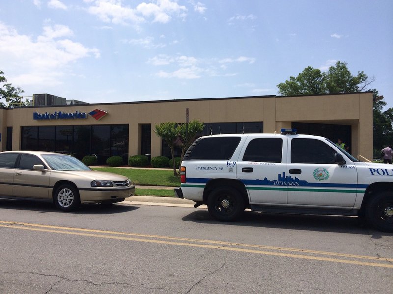 Little Rock police respond to a robbery Monday morning at the Bank of America branch at 8200 Geyer Springs Road.