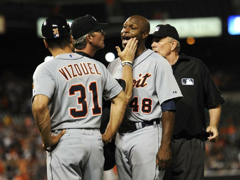 Detroit Tigers outfielder Torii Hunter gets a little tap on the side of his face by umpire Paul Nauert after being hit by a pitch thrown by Baltimore’s Bud Norris on Monday night. Hunter (Pine Bluff) wasn’t upset with Nauert, calling the umpire his “buddy” afterward. 