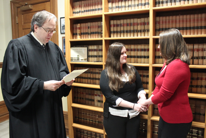 Heather Linton, left, and Laura Hightower are married Wednesday by Pulaski County Circuit Judge Morgan Welch.