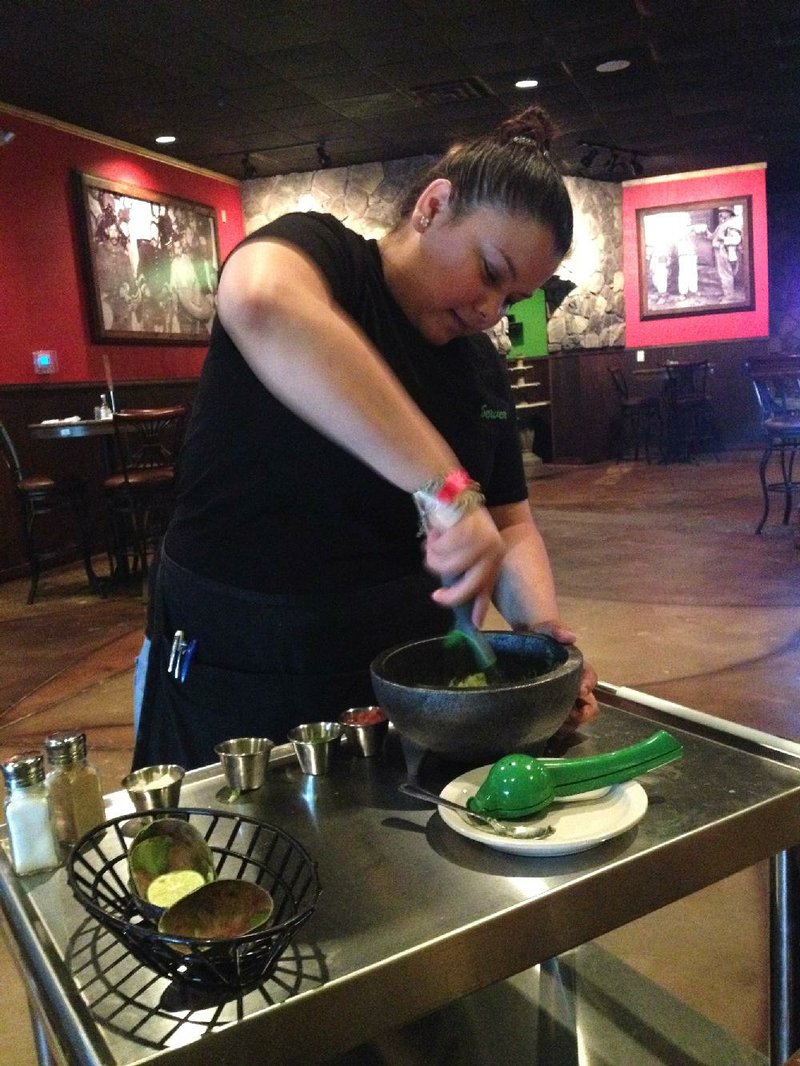 Guacamole is made fresh at the table at Cilantros Grill in North Little Rock. 
