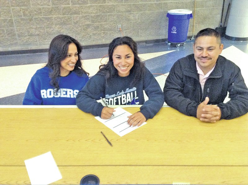 Submitted Photo Jennifer Gonzalez, Rogers High outfielder, signed a national letter of intent Wednesday to play softball at Wallace State Community College in Hanceville, Ala.