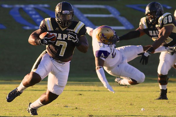 UAPB tight end CJ Branch runs upfield after a catch during first-half action at Golden Lion Stadium on September 21, 2013. UAPB, a historically black college, fell below the NCAA's benchmark score in the latest Academic Progress Rate numbers released Wednesday. 