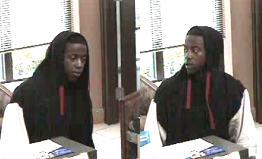 This surveillance image released by Little Rock police shows a suspect in the May 13 robbery of a US Bank at 5200 Kavanaugh Boulevard.