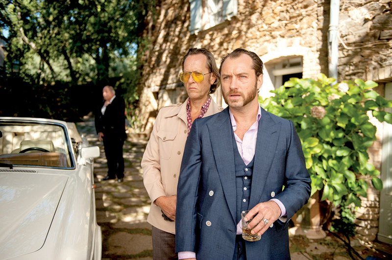 Dickie (Richard E. Grant) does his best to rein in the force of nature that is an affronted, eponymous safe cracker (Jude Law) in Richard Shepard’s take on British noir Dom Hemingway. 