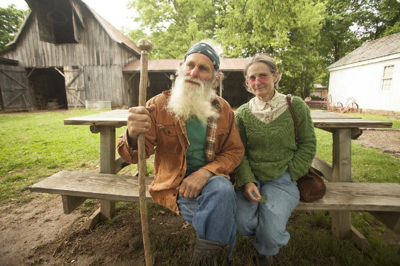 RYAN MCGEENEY/Arkansas Democrat-Gazette --05-15-2014--  
Robert Runyan of Winslow, seen here with his wife, Dorothy Runyan, is the recipient of the Arkansas Arts Council 2014 Arkansas Living Treasure award. For more than 35 years, Runyan has been building log and stone structures throughout Arkansas, Oklahoma and Colorado using mostly hand tools and centuries-old building techniques. Runyan was honored Thursday night at a reception at the Shiloh Museum of Ozark History in Springdale.