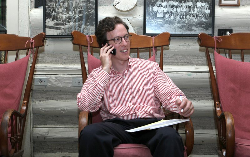 Tommy Moll, candidate for the 4th District of Congress, makes calls Tuesday at his family’s home near Hot Springs. 