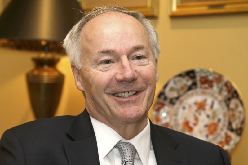 In this photo taken Thursday, May 8, 2014, Republican hopeful in the race for Arkansas governor Asa Hutchinson is interviewed in Little Rock. 