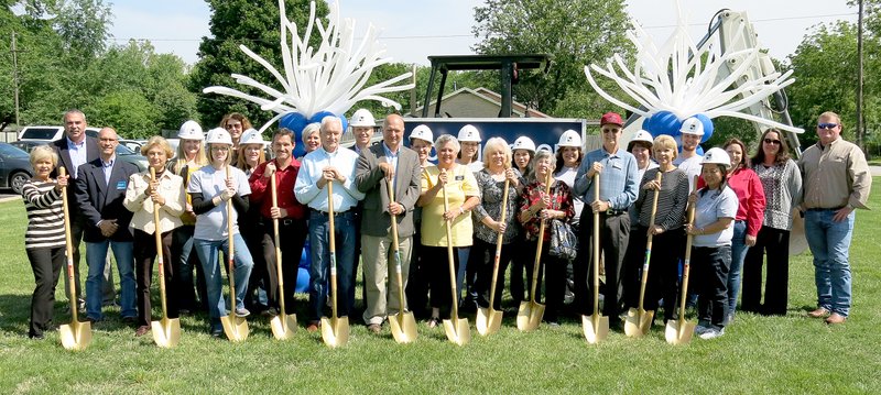 Photo by Randy Moll Participating in groundbreaking ceremonies for the new facility of the Gentry branch of Arvest Bank on Friday morning were: Linda Gregory (front, left), Michael Shirley, Wanda Meyer, Becca Cross, Kevin Johnston, Floyd Norris, Fred Rosborough, Janice Arnold, Linda Hook, Inez Long, Danny Feemster, Caroline Riggs, Jennifer Xiong, Kevin Clement (back, left), Chari Hillenburg, Tammy Engle, Lori Winesburg, Beth Graves, Roger Holroyd, Kristi Hollaway, Katie Dorsey, Andrea Tun, Amber Knox, Tammy Seitz, Richie Froman, a representative from Oakridge Builders, Lorrie Smith and a representative from Oakridge Builders.