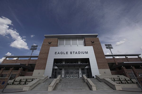 This Aug. 28, 2012 file photo shows the front entrance of Eagle Stadium at Allen High School in Allen, Texas. The $60 million high school football stadium that opened to massive fanfare in 2012 will be shut down for the upcoming season after cracks were found in the building's concrete concourse. (AP Photo/LM Otero, File)