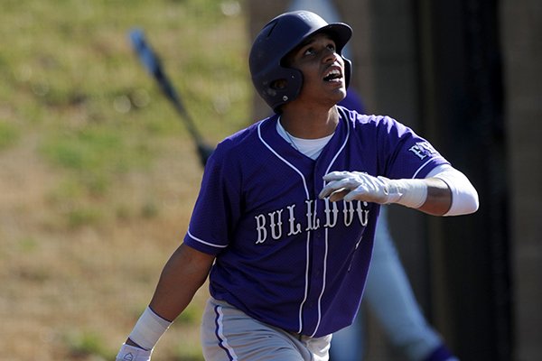 Fayetteville senior Kyle Pate hits a 2-run double during the second inning against Siloam Springs Tuesday, March 18, 2014, at Bulldog Stadium in Fayetteville.