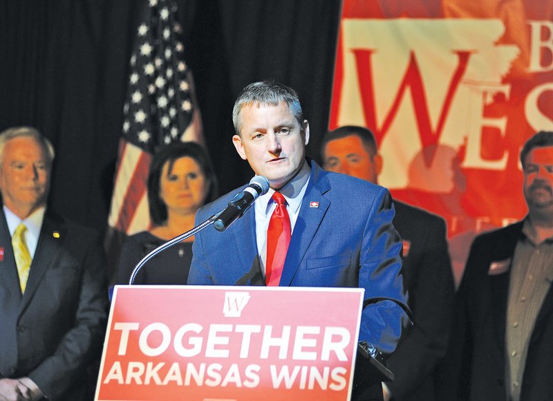 The Sentinel-Record/Mara Kuhn VICTORIOUS: State Rep. Bruce Westerman, R-District 22, makes his primary victory speech in the 4th Congressional District race at the Five Star Dinner Theatre on Tuesday.