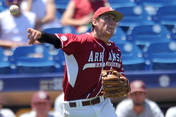 Arkansas third baseman Bobby Wernes makes a throw during a SEC Tournament game against Texas A&M on Tuesday, May 20, 2014 at Hoover Metropolitan Stadium in Hoover, Ala. 