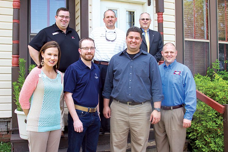 Representatives from some of the financial institutions participating in Hamburgers for Homelessness gather with Jacob’s Place Board President Mat Faulkner in front of Jacob’s Place. In the front row, from left, are Amanda McClish of First Community Bank, Jon Holman of Southern Bank, Faulkner, and Justin Lawson of Centennial Bank; and back row, Robert Hare of Simmons Bank, Matt House of Regions Bank and J. Patrick Stegall of First Security Bank.