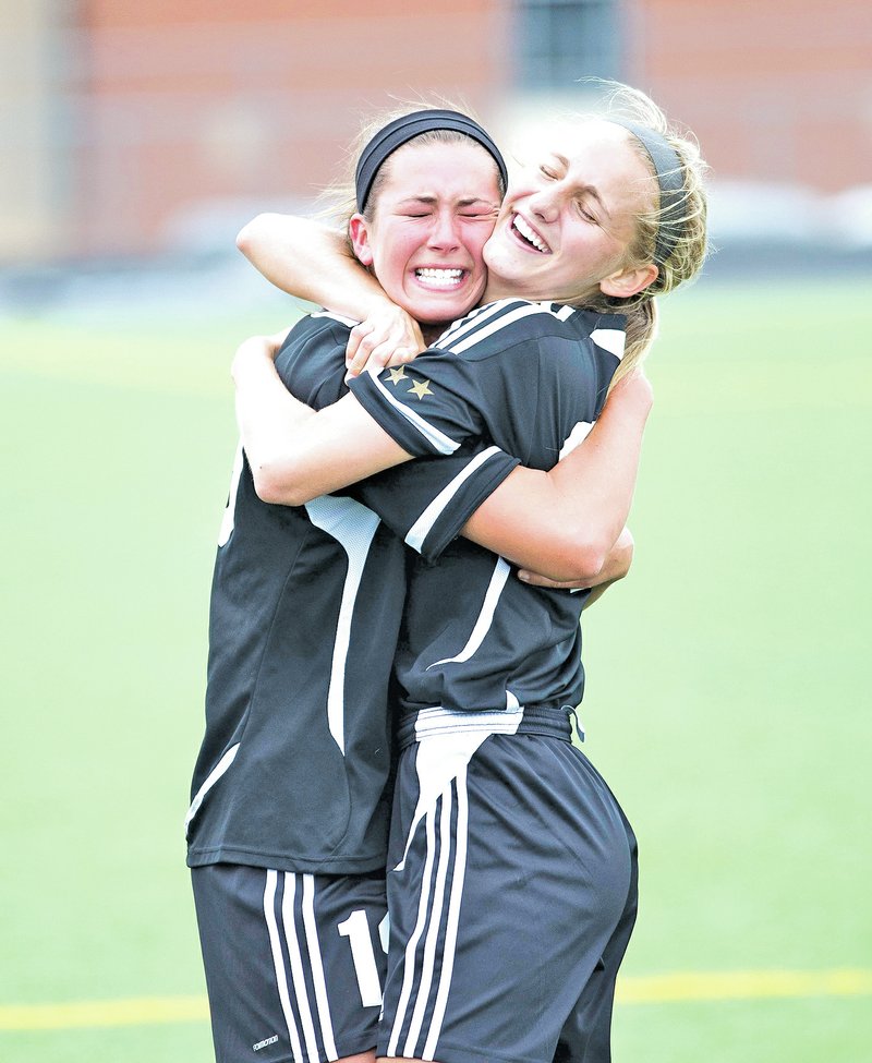  Special To NWA Media David J. Beach McKenzie Dixon and Morgan Freehling of Bentonville celebrate their victory over Mount St. Mary on Saturday during the semifinal match at Tiger Athletic Complex.