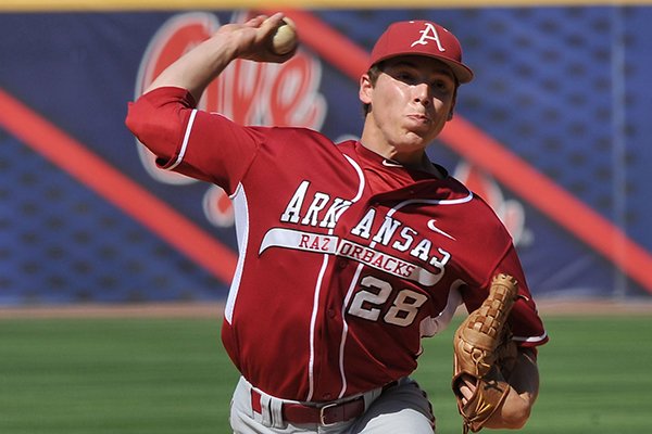 Arkansas pitcher James Teague throws a pitch during a SEC Tournament game against Ole Miss on Friday, May 23, 2014 at Hoover Metropolitan Stadium in Hoover, Ala. 