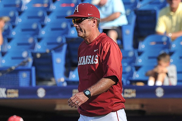 Arkansas coach Dave Van Horn walks toward the mound during a SEC Tournament game against LSU on Thursday, May 22, 2014 at Hoover Metropolitan Stadium in Hoover, Ala. 
