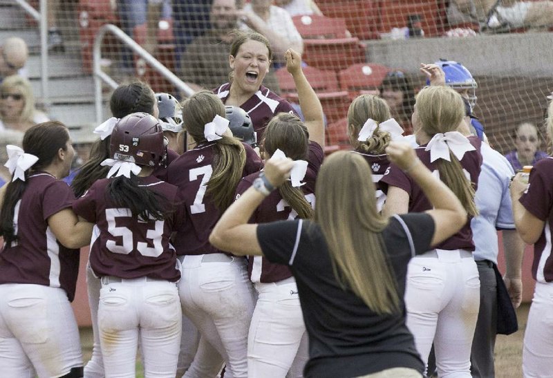Photos by David J. Beach - The Benton Panthers celebrate as Breanna Langford hit a homerun in the top of the 7th inning against the Sheridan Yellowjackets to claim the 6A high school softball championship, at Bogle Park at the University of Arkansas, Fayetteville, AR on May 23, 2014