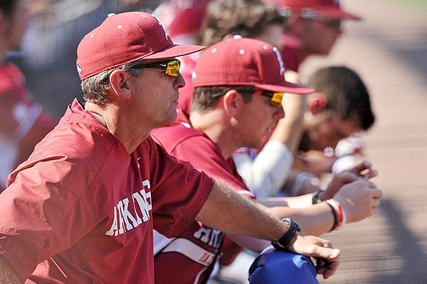 Arkansas coach Dave Van Horn watches from the dugout during a SEC Tournament game Friday, May 23, 2014 at Hoover Metropolitan Stadium in Hoover, Ala. 