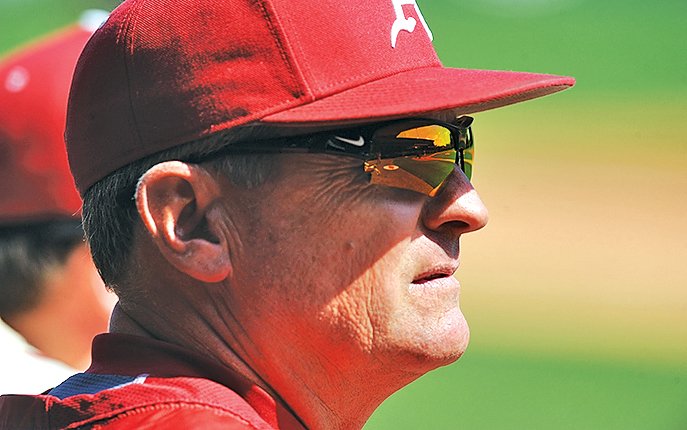 File Photo ANDY SHUPE Dave Van Horn, Arkansas coach, watches from the dugout April against South Carolina at Baum Stadium in Fayetteville.