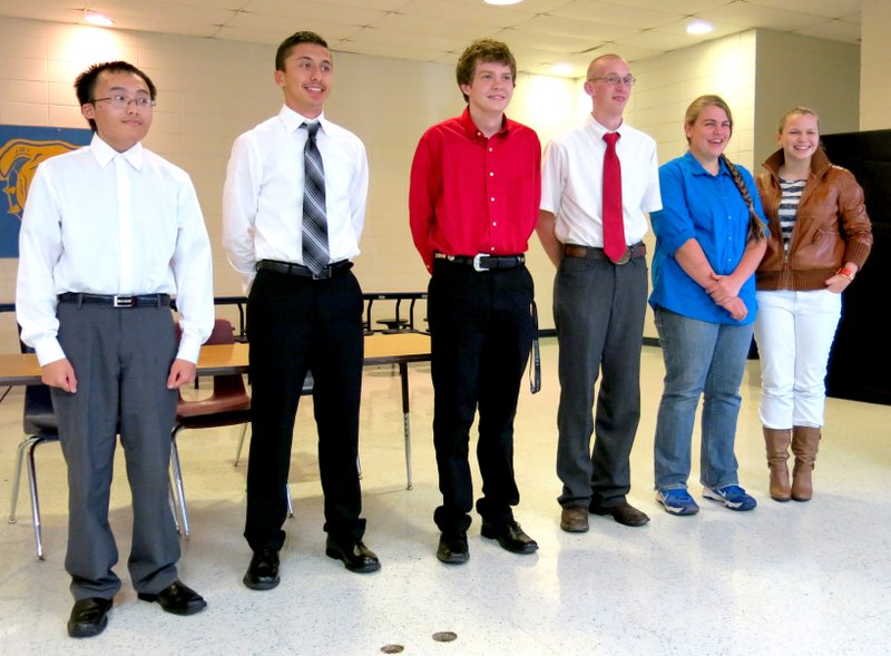 Photo by Mike Eckels Five Decatur High School seniors were given scholarships by the Decatur Chamber of Commerce during a banquet held in the cafeteria at the high school May 13. The award recipients were Feng Xiong (left), Orlando Aquirre-Martinez, Cordelle Bell, Timothy Clements, Hannah Ramsey and Lynlee Witcher.