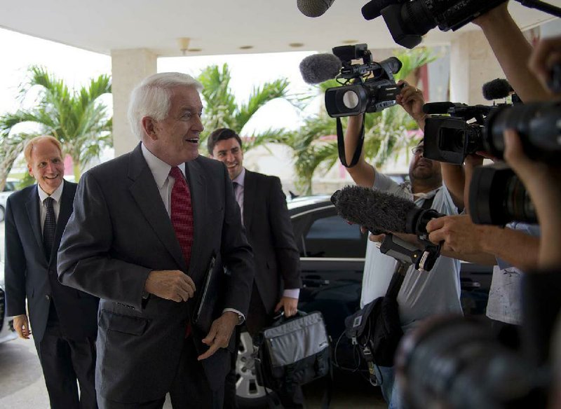 Thomas Donohue (left), U.S. Chamber of Commerce president and chief executive officer, talks with reporters Tuesday before a meeting with Cuban Foreign Minister Bruno Rodriguez in Havana. 