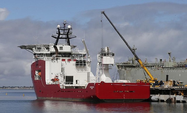 The Australian navy ship Ocean Shield is docked in March at a base in Perth, Australia, while being fitted with the pinger locator used in the hunt for Malaysia Airlines Flight MH370. 